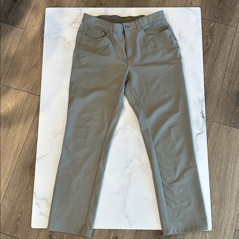 Greg Norman Golf Slacks 3 pr navy, grey & greenish-grey. 32w x 29 length - Picture 3 of 4